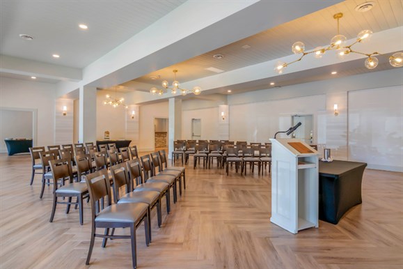The table is set beautifully for the next event. Silverware and linen. 